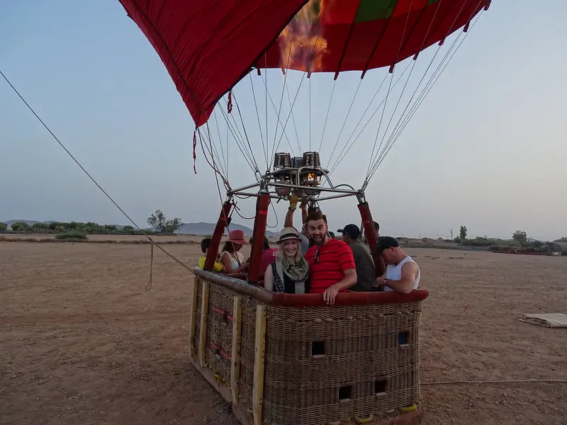 Travelers in a balloon basket ready for take-off near Marrakech
